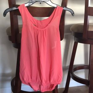 Charlotte Russe Peach tank top with ruffle back.